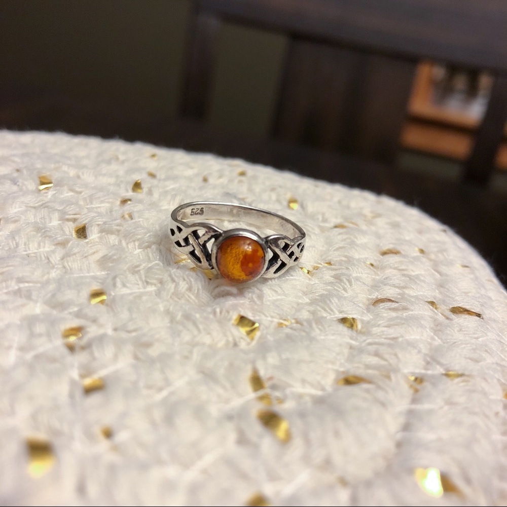 Celtic sterling silver ring with brown stone